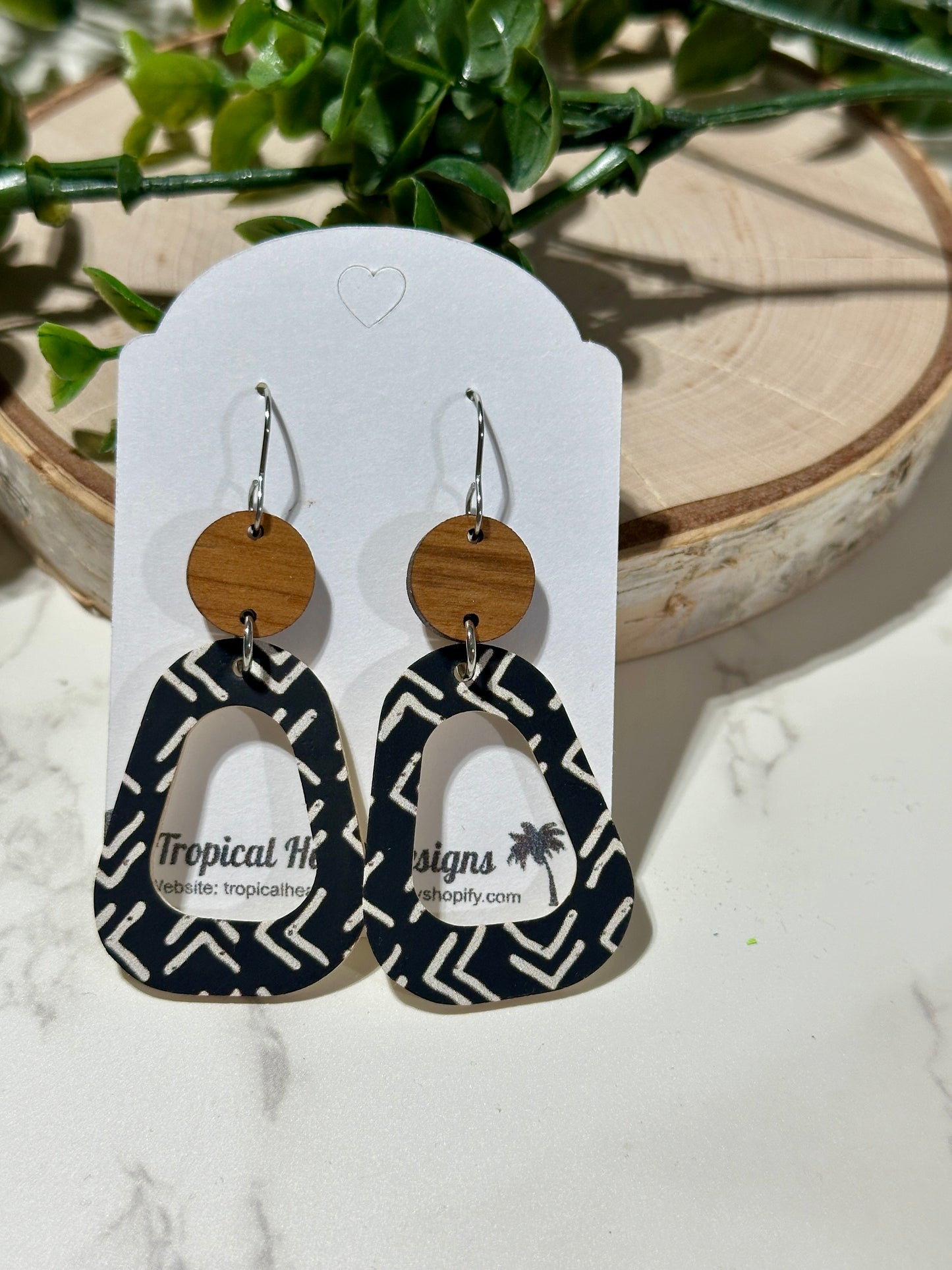 Open Rounded Triangle Earrings - White Arrows on Black